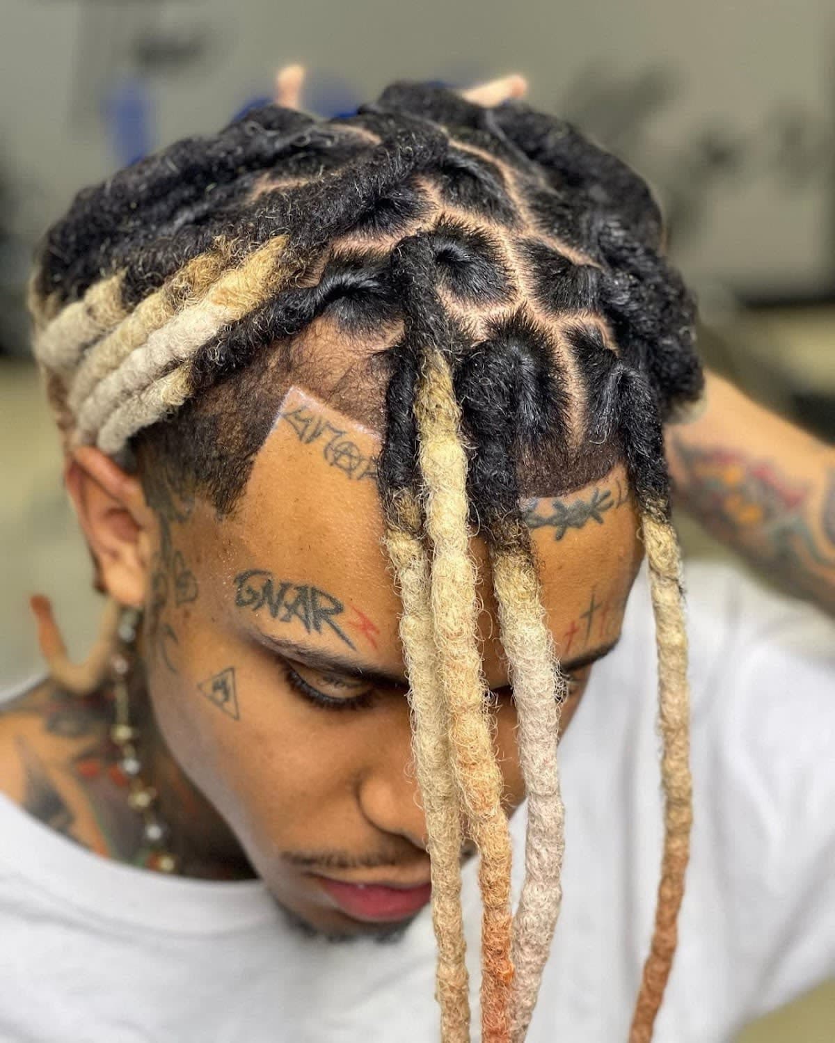 Tattoo and Dreadlock